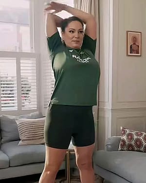 Kelly Brook doing some stretching'